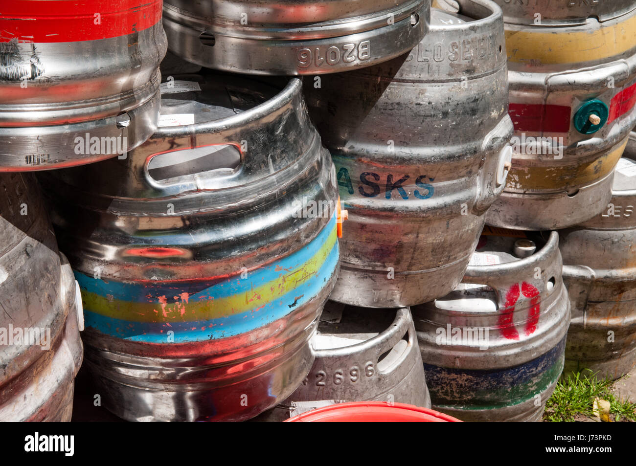 Beer kegs used to store drinks stacked up Stock Photo Alamy