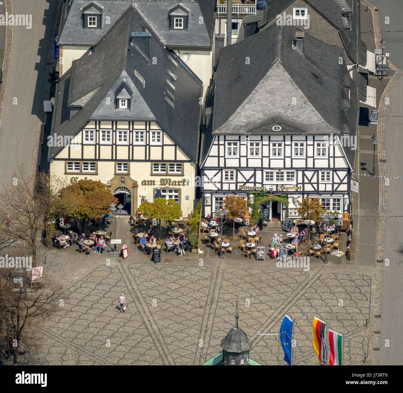 Cafe at the market and Jägerhof, half-timbered house, half-timbered houses, historic restaurant, Brilon, Sauerland, Hochsauerlandkreis, North Rhine-We Stock Photo