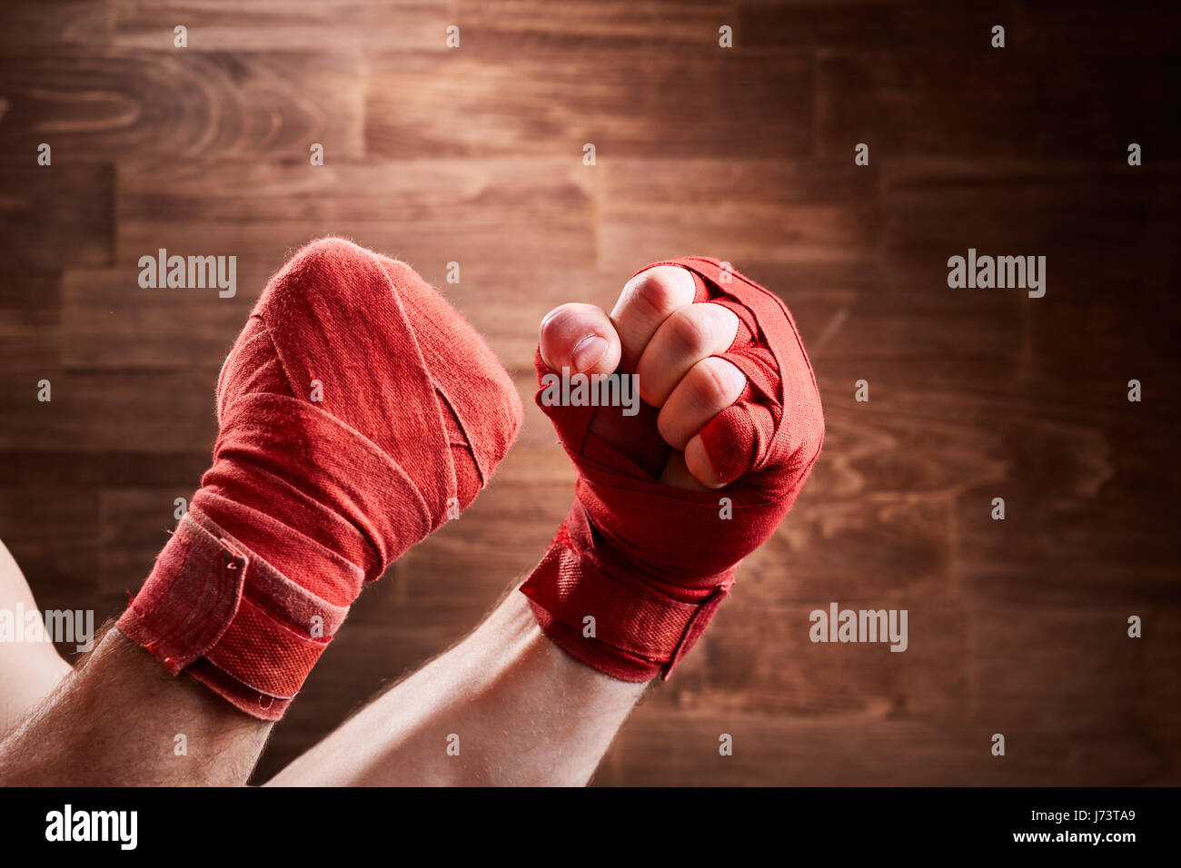 Close-up of Hands of Boxer with Bandage Ready for a Fight Against