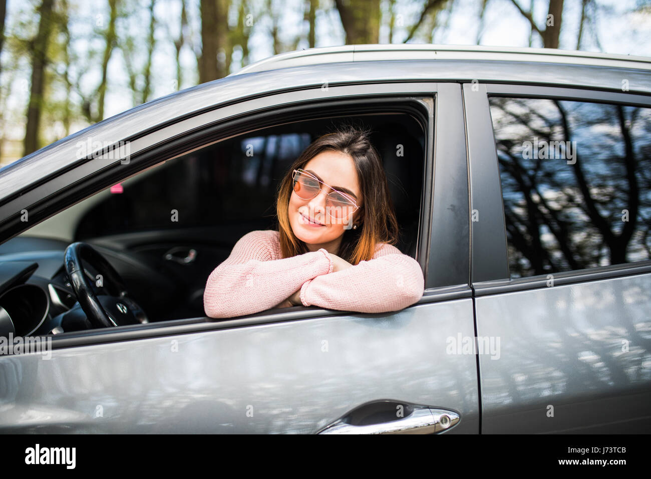 Leaning out of car