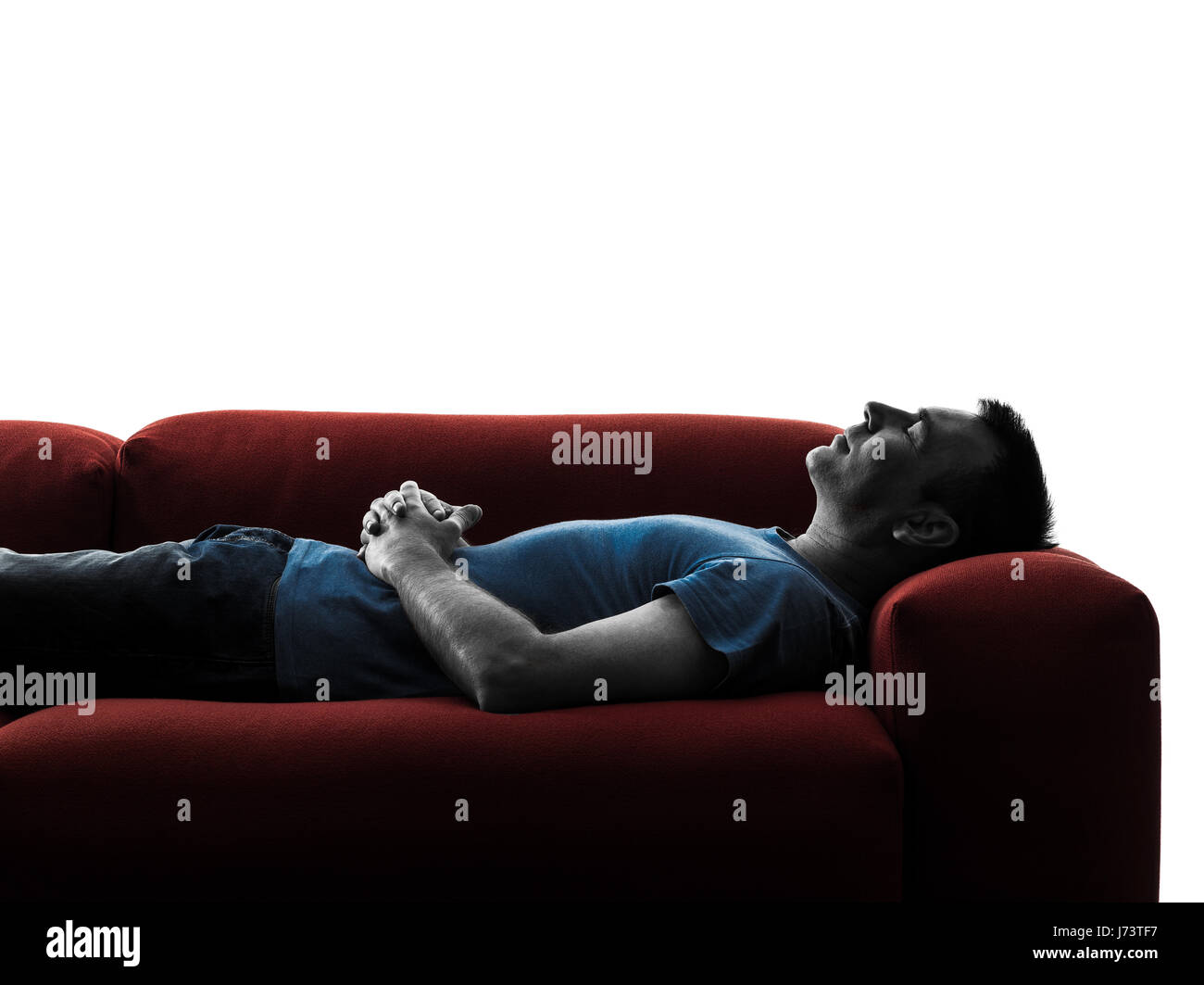 one caucasian man sofa couch sleeping in silhouette isolated on white background Stock Photo
