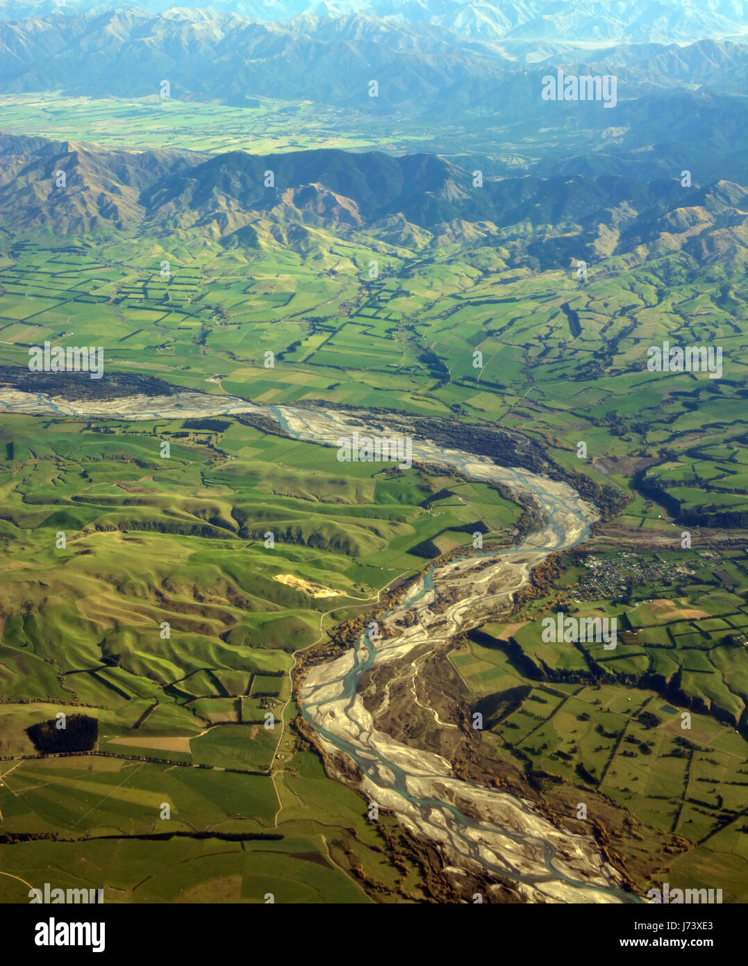 Aerial View of the Waiau River, North Canterbury, New Zealand. In the foreground is Waiau township and in the background is Hanmer and farms. Stock Photo