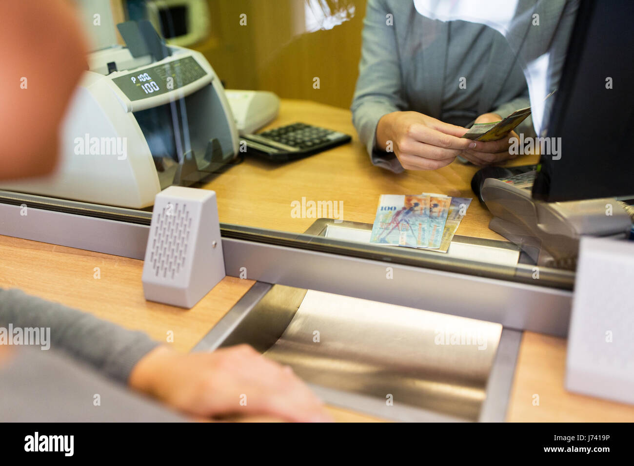 clerk counting cash money at bank office Stock Photo Alamy