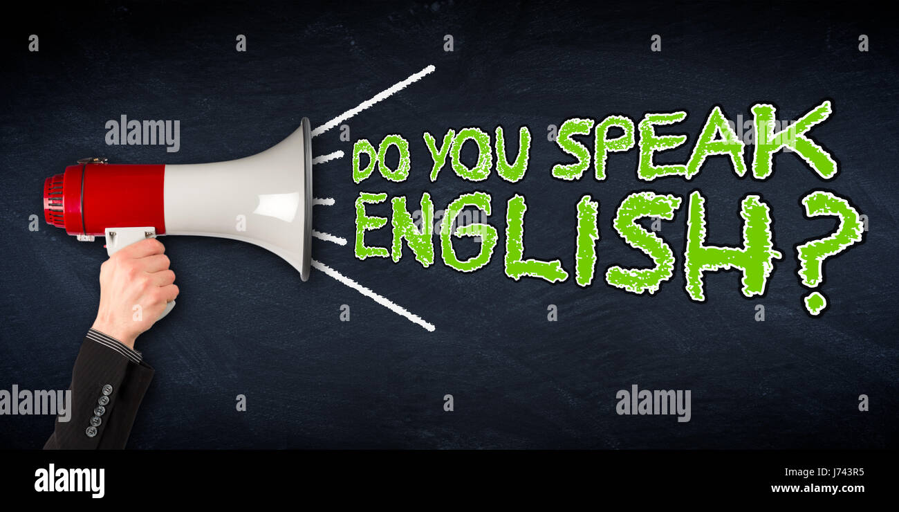 do you speak english? wide slate blackboard chalkboard with hand holding megaphone business education concept background Stock Photo