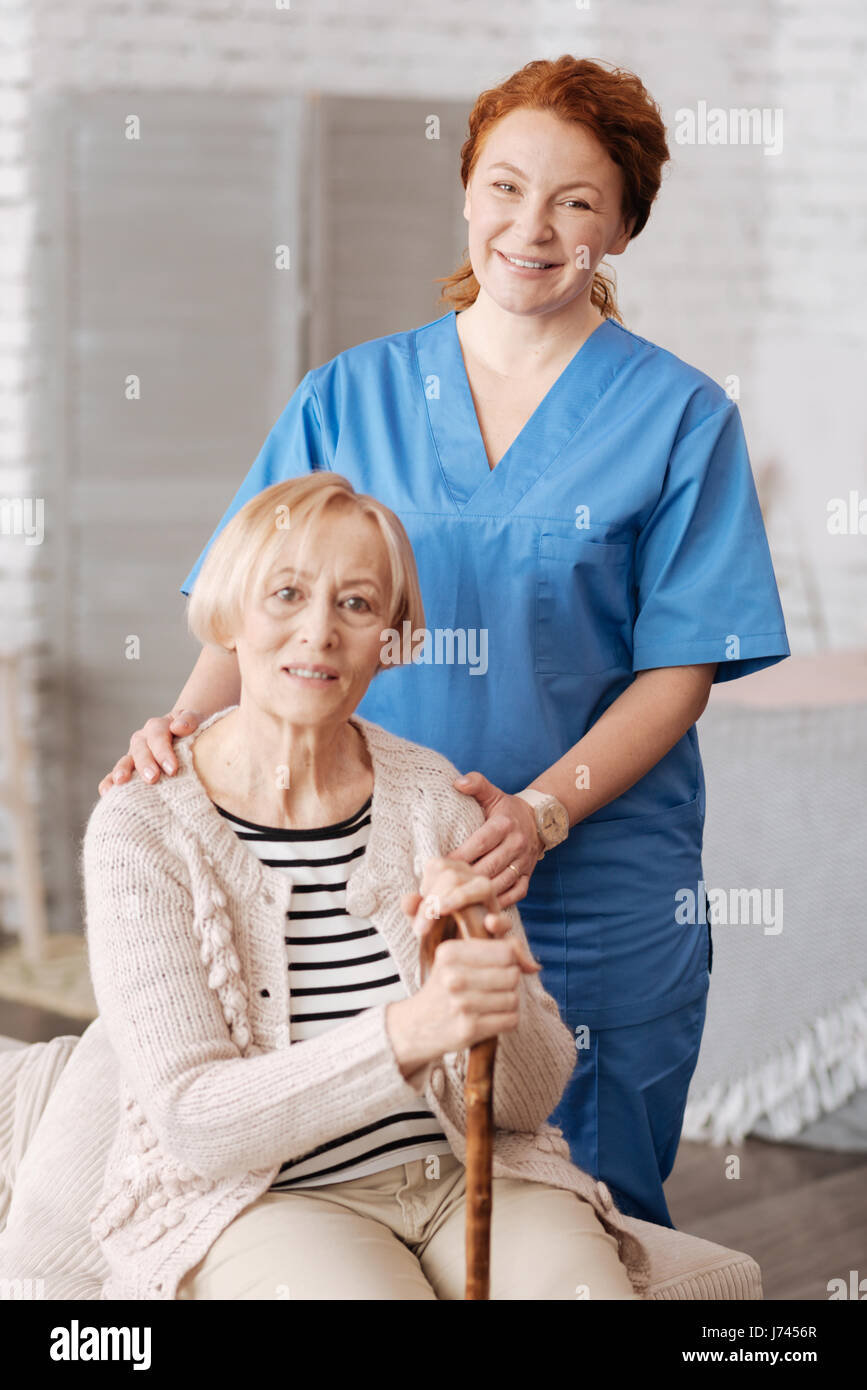Trained private medical worker doing a weekly checkup Stock Photo