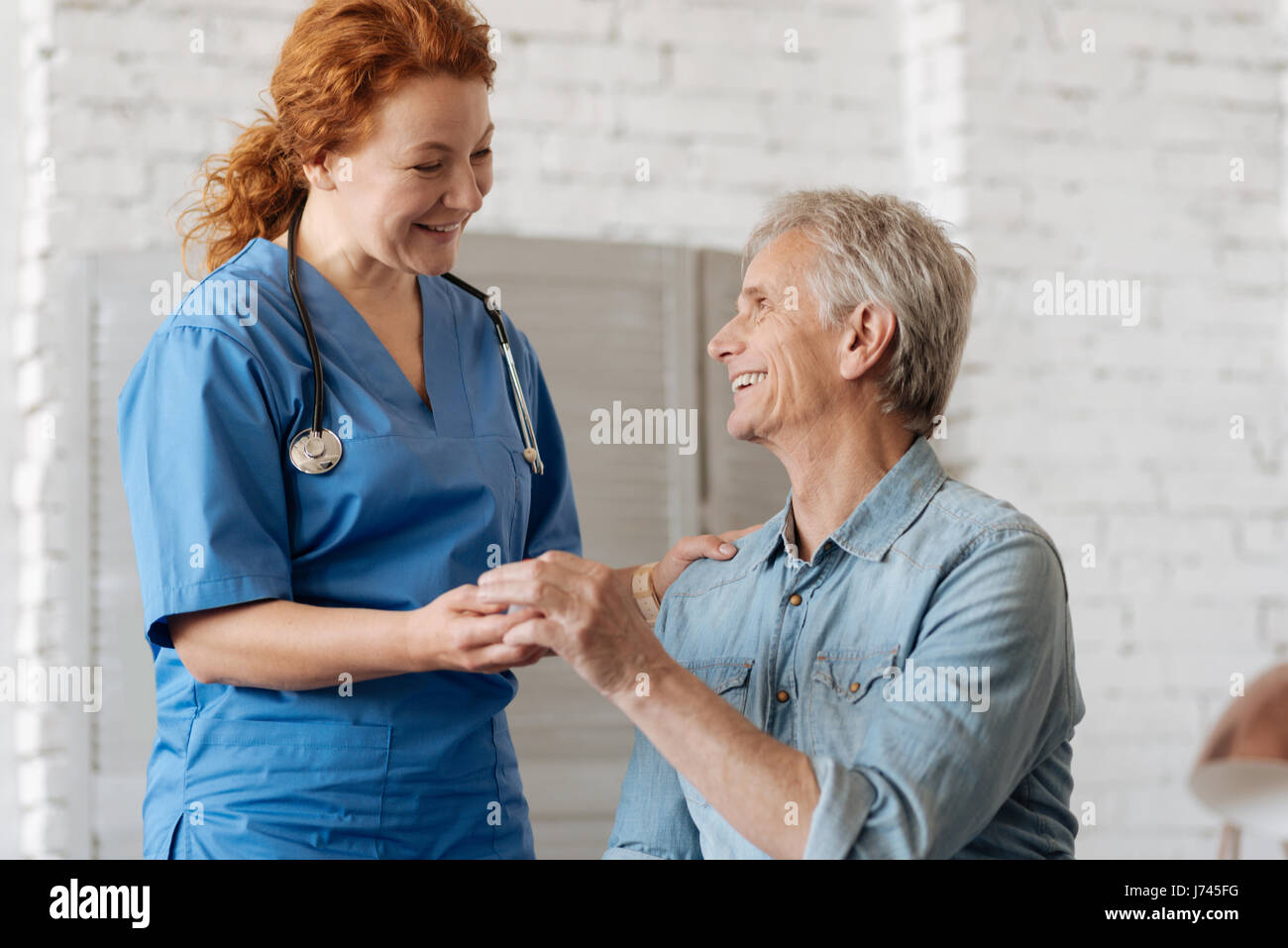 Professional private doctor prescribing her patient treatment Stock Photo