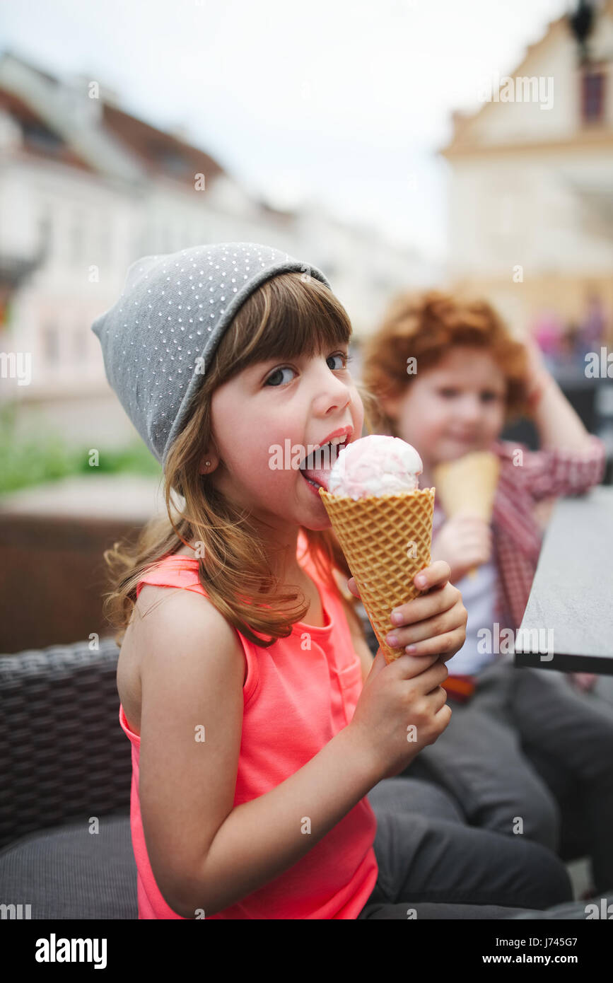 two cute hipsters eating icecream Stock Photo