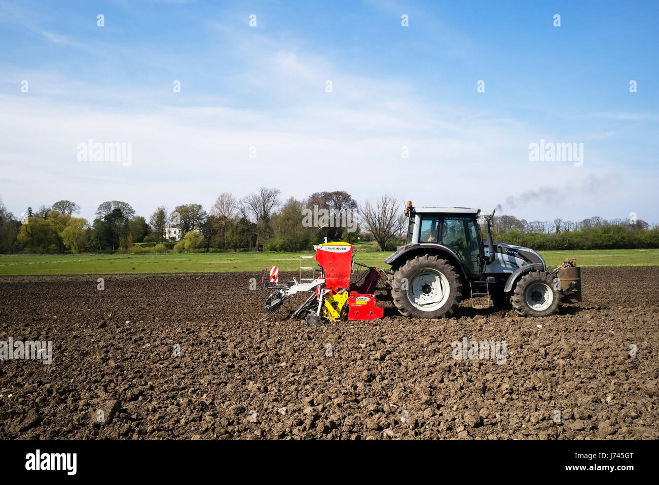 Spring seed drilling in the Vale of York, Middlethorpe Ings, York, England, UK Stock Photo