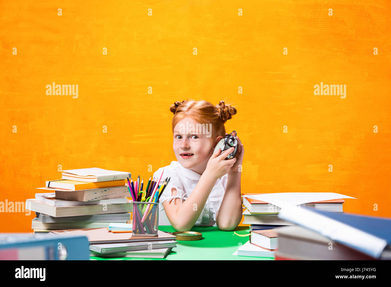 Teen girl with lot of books Stock Photo - Alamy