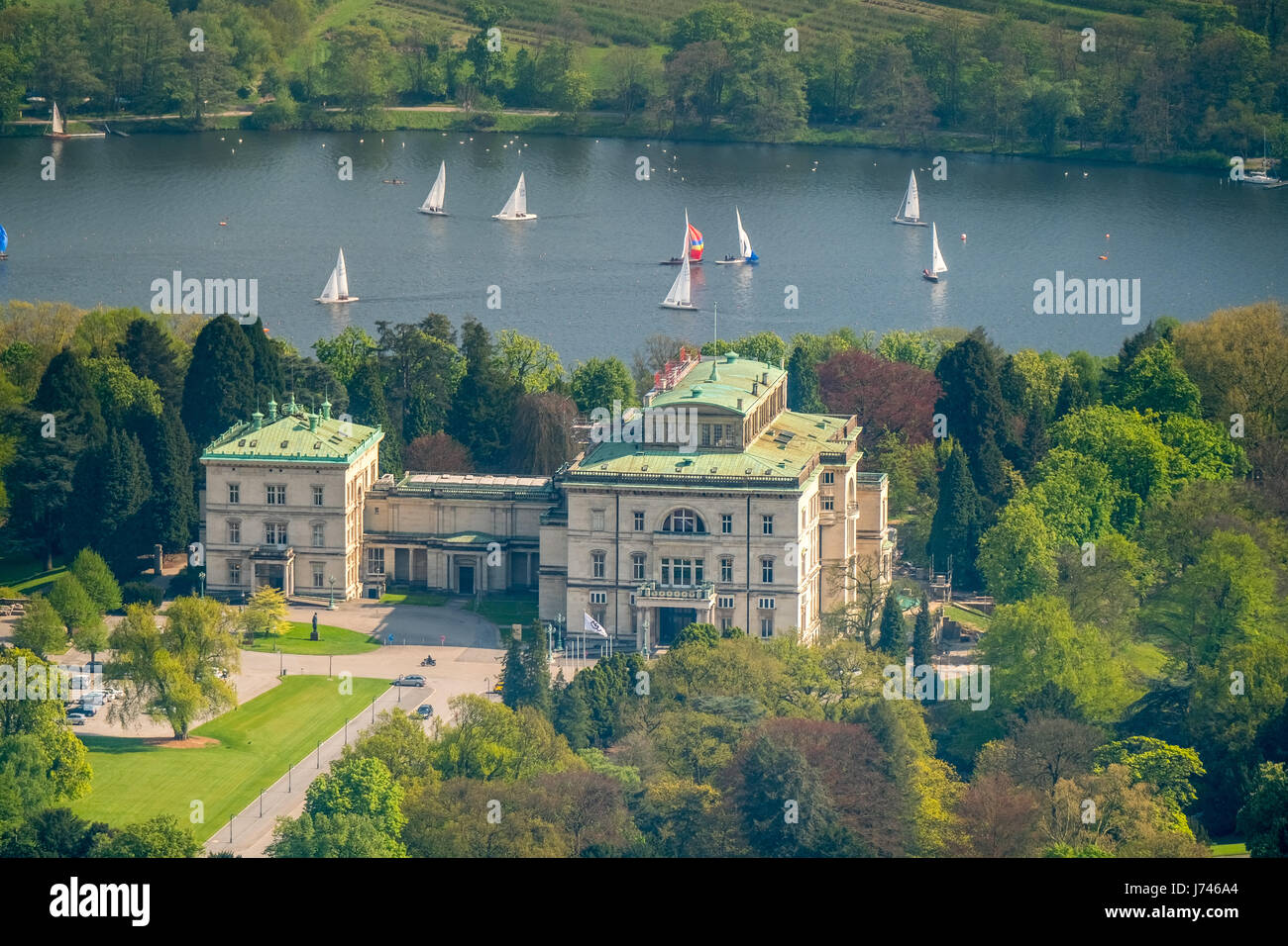 Villa Hügel with sailing boats on the Baldeneysee, historical seat of the Stahlbarone, former company headquarters of the company Krupp, historical vi Stock Photo
