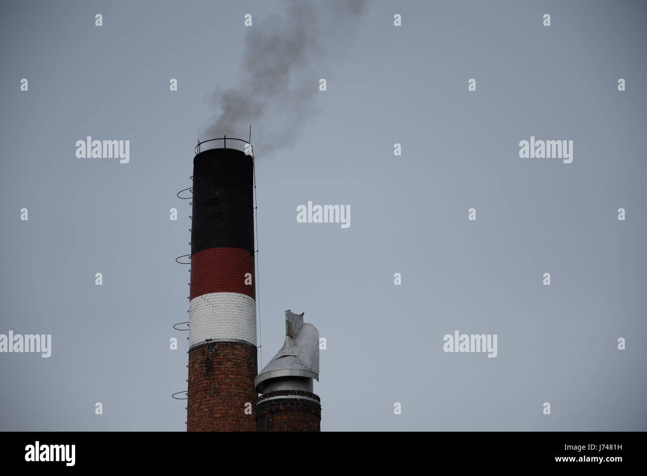 Dark Black Smoke From Chimney High Resolution Stock Photography and