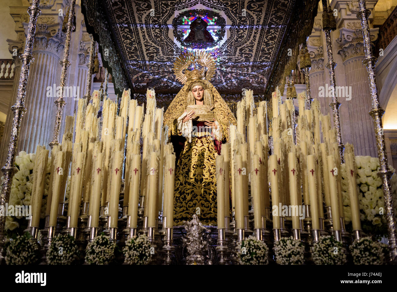 Image of the Virgin Mary with candles used in one of the processions of Semana Santa (Easter) Stock Photo