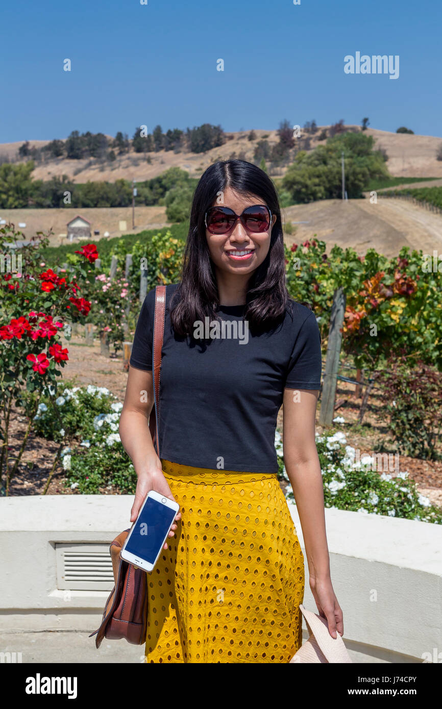 adult woman, female tourist, tourist, visitor, visiting, Chateau, Domaine Carneros, Napa, Napa Valley, Napa County, California, United States Stock Photo