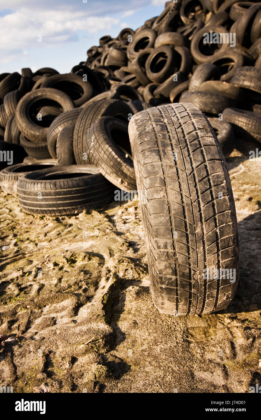 environment enviroment stack mull refuse tyre tire tyres recycling rubber old Stock Photo
