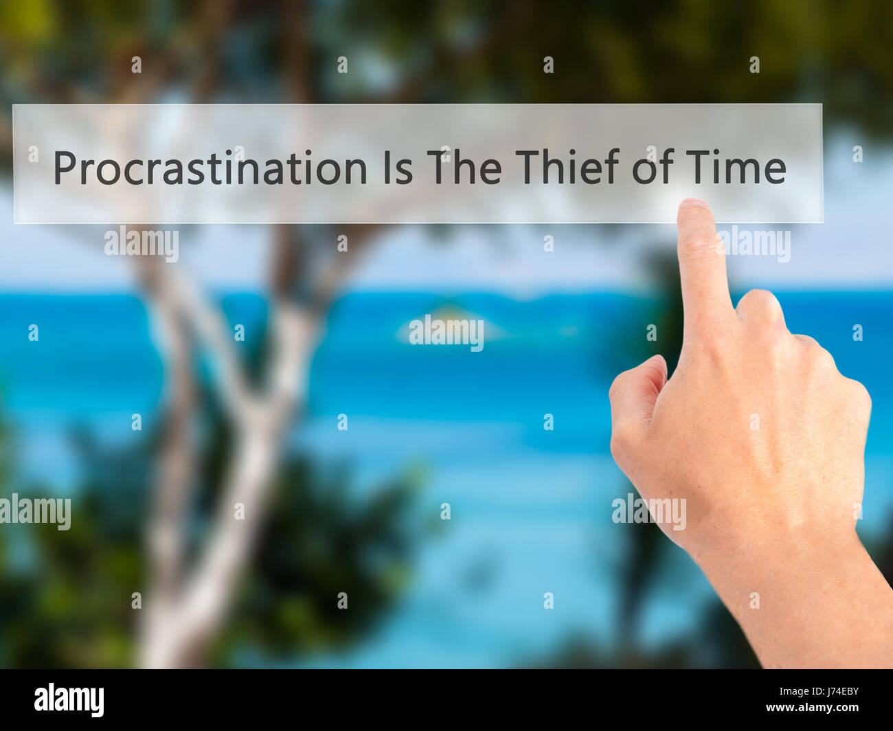 Procrastinator Button Procrastination Is The Thief of Time - Hand pressing a button on ...