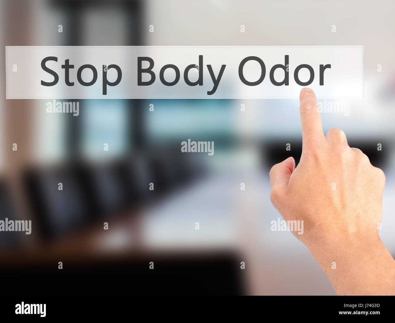 Stop Body Odor - Hand pressing a button on blurred background concept ...