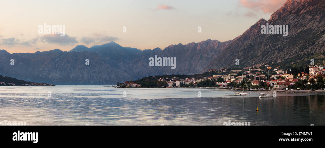 Beautiful view of Kotor Bay, Montenegro, at sunset.  Kotor Bay is a popular cruise destination on the Dalmatian Coast Stock Photo
