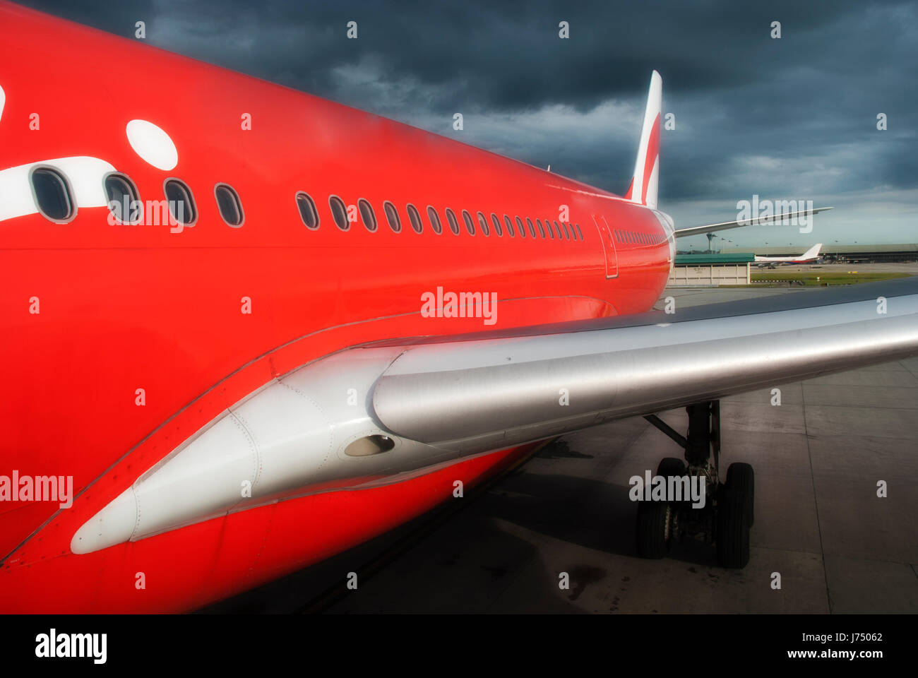 arrival aviation airport air aircraft aeroplane plane airplane blue travel big Stock Photo