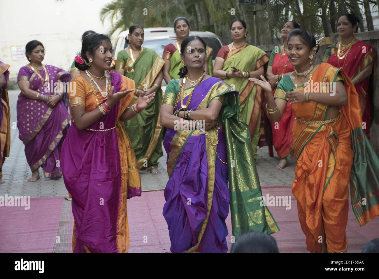 Women dancing at baby shower ceremony Stock Photo Alamy