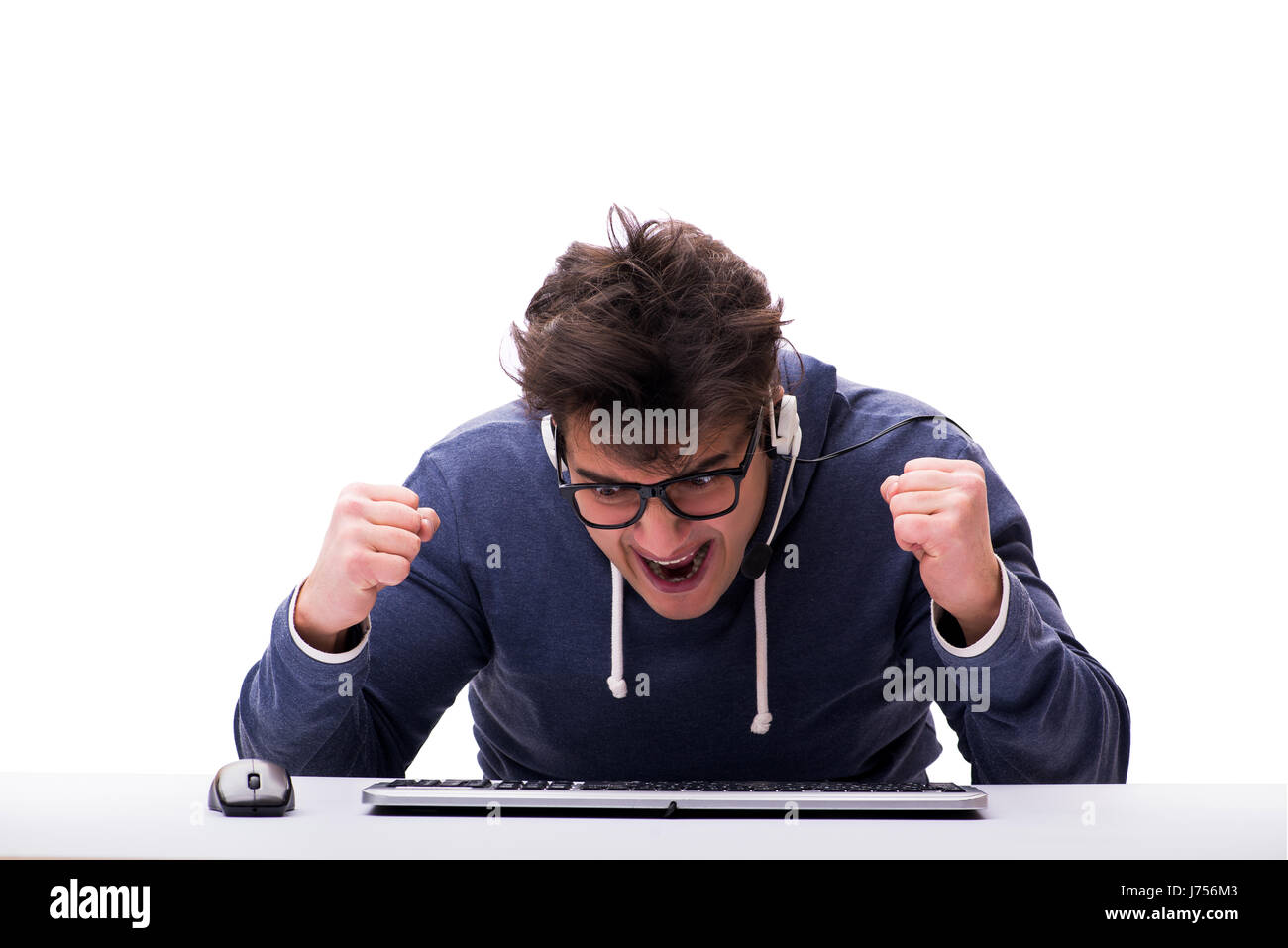 Funny nerd man working on computer isolated on white Stock Photo