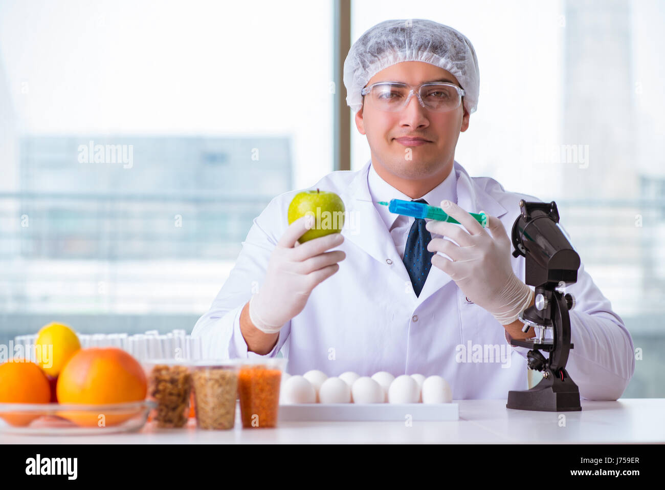 Nutrition expert testing food products in lab Stock Photo Alamy