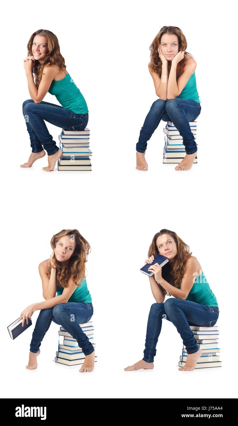 Student sitting on stack of books Stock Photo - Alamy
