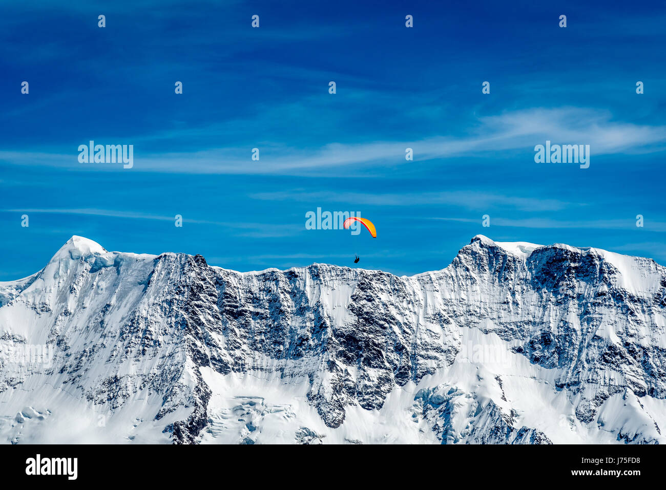 Swiss Alps Paragliding Stock Photo