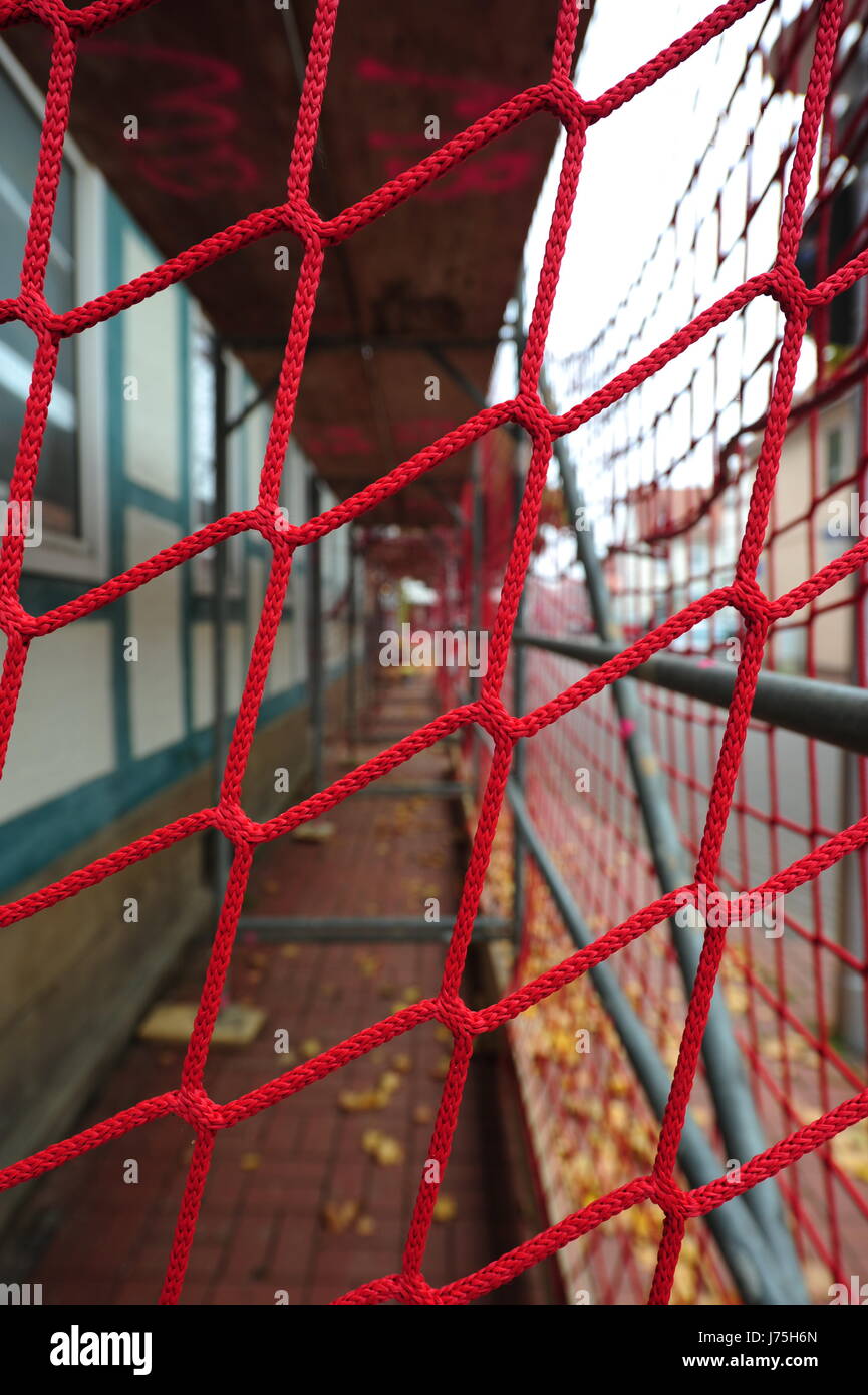 city town ensure small town scaffolding red knot house home dwelling house Stock Photo