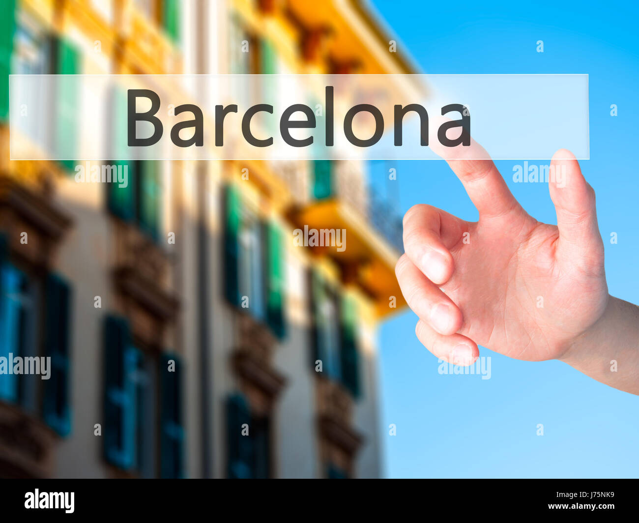 Barcelona - Hand pressing a button on blurred background concept . Business, technology, internet concept. Stock Photo Stock Photo