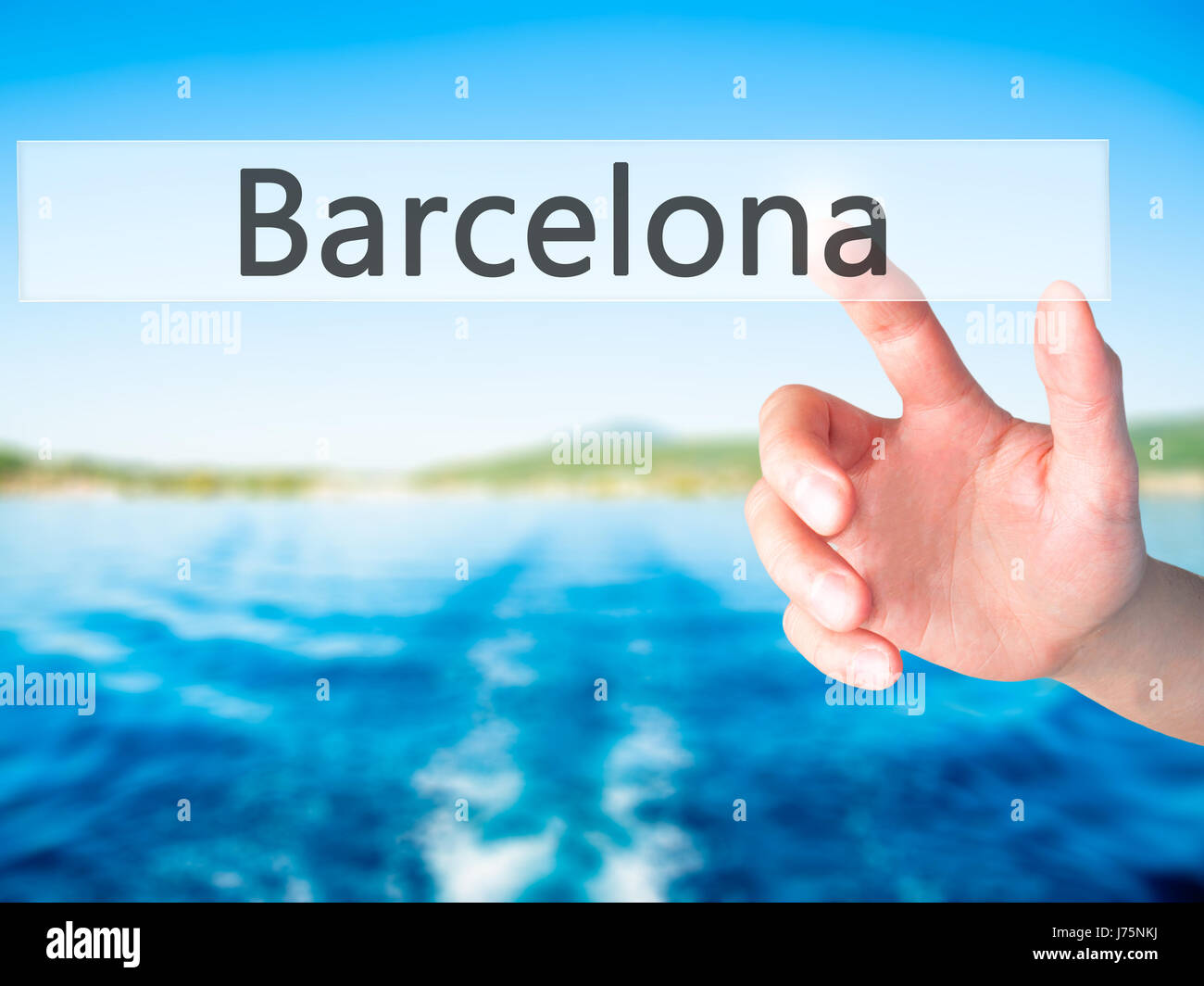 Barcelona - Hand pressing a button on blurred background concept . Business, technology, internet concept. Stock Photo Stock Photo