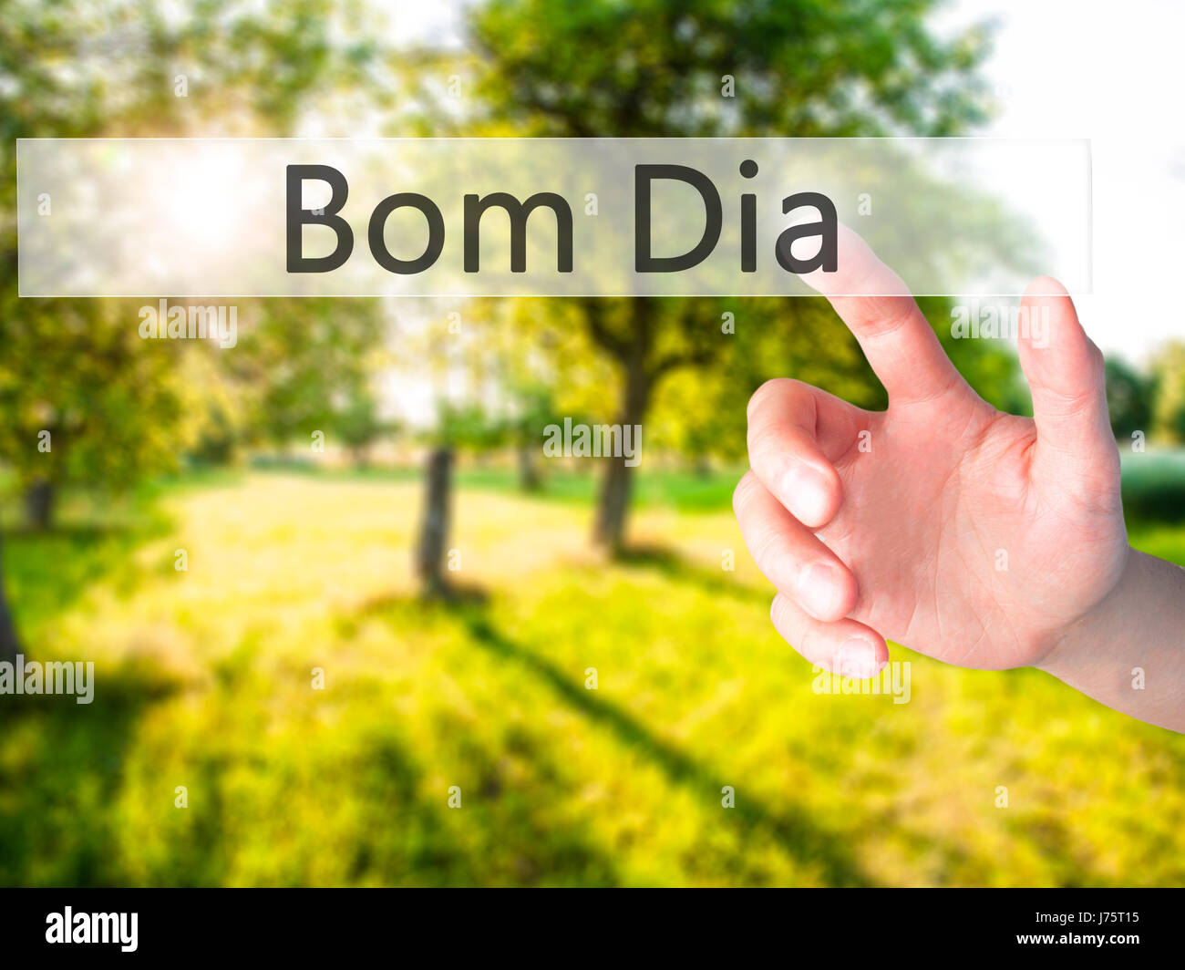 Bom Dia (In portuguese - Good Morning) - Hand pressing a button on blurred  background concept . Business, technology, internet concept. Stock Photo  Stock Photo - Alamy