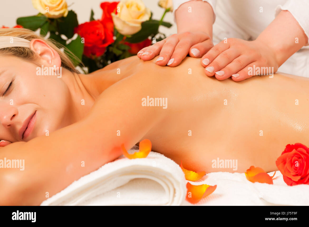 woman getting a back massage spa Stock Photo