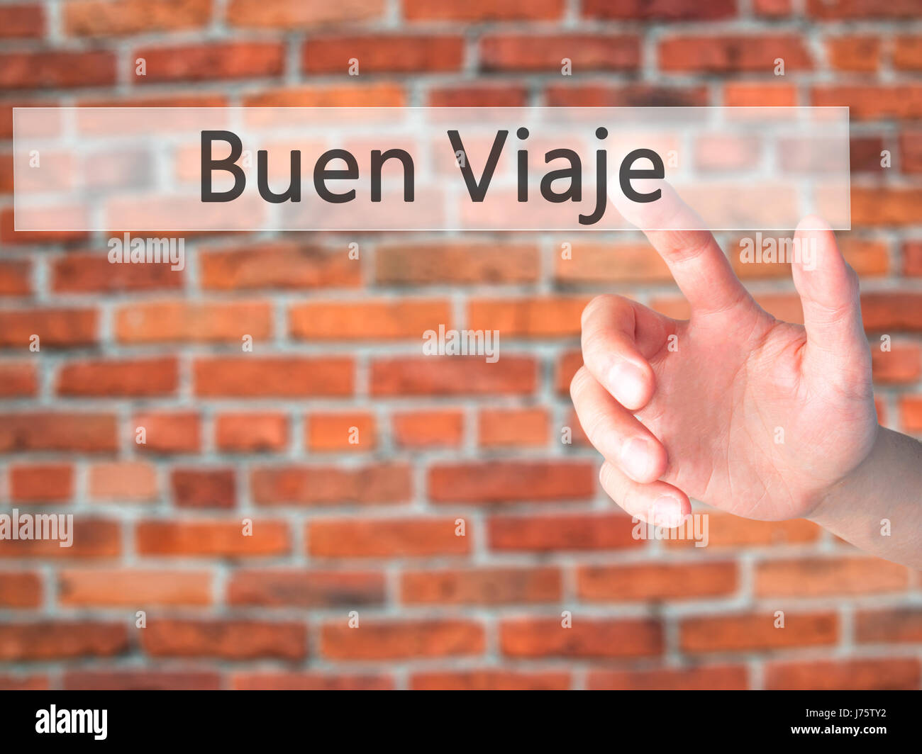 buen-viaje-good-trip-in-spanish-hand-pressing-a-button-on-blurred