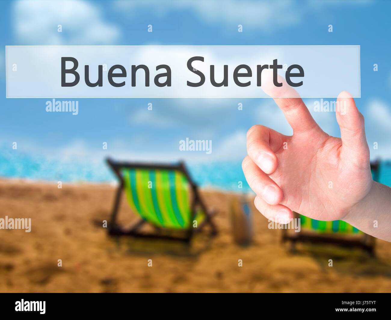 Buena Suerte ( Good Luck in Spanish) - Hand pressing a button on ...