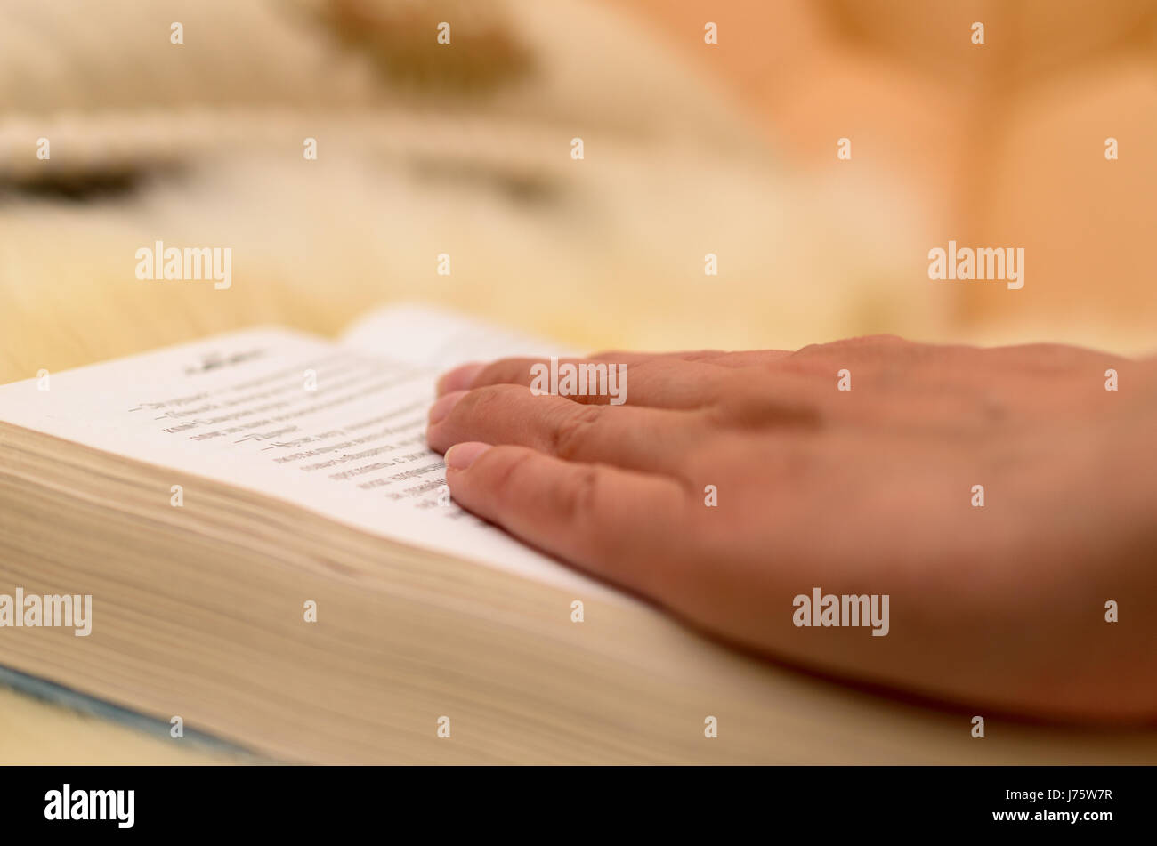 Hands turn the page and lead the pages Stock Photo Alamy