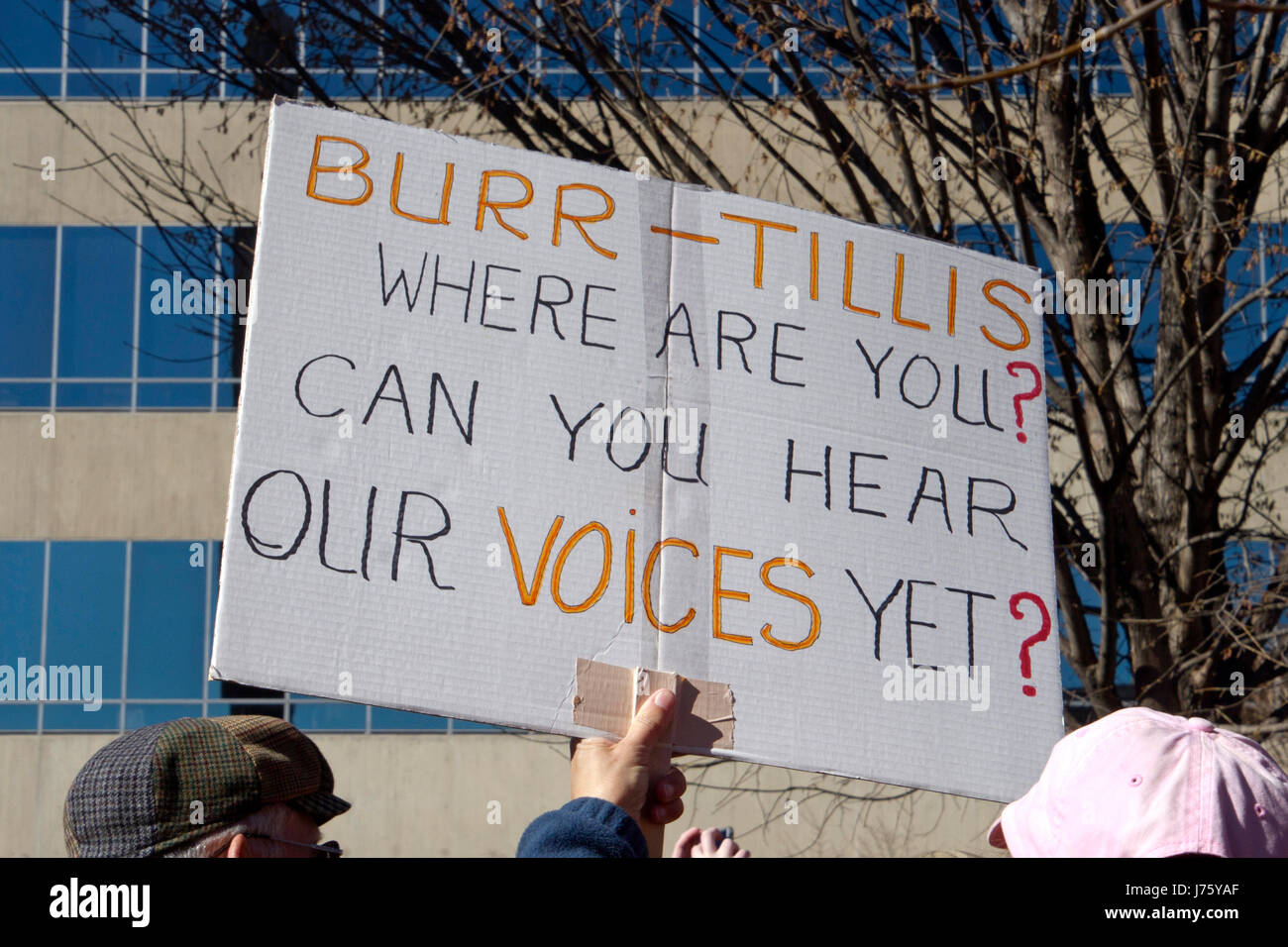 Asheville, North Carolina, USA - February 25, 2017:  North Carolina voters hold a sign at an Affordable Care Act rally directing its message to NC Rep Stock Photo