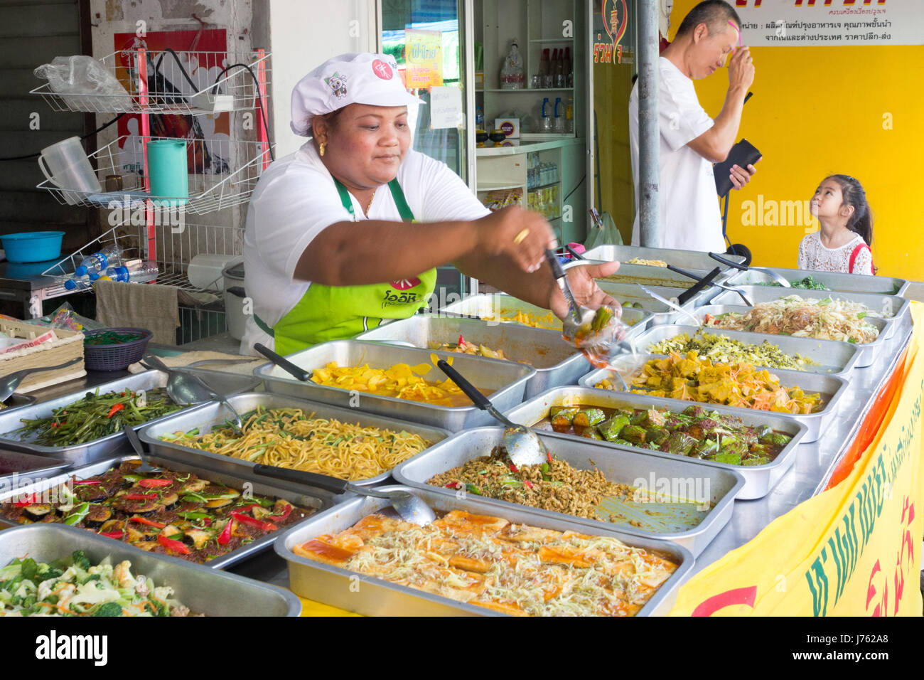 Serving vegetarian food at the annual Phuket vegetarian festival, PHuket, Thailand Stock Photo
