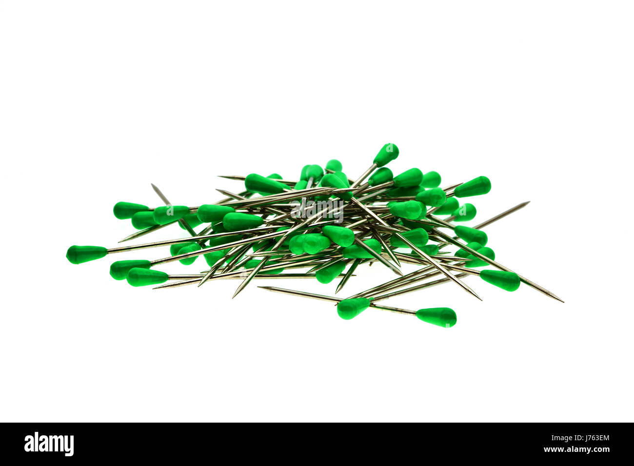 needles sew pins delimit to approach green coloured colourful gorgeous Stock Photo