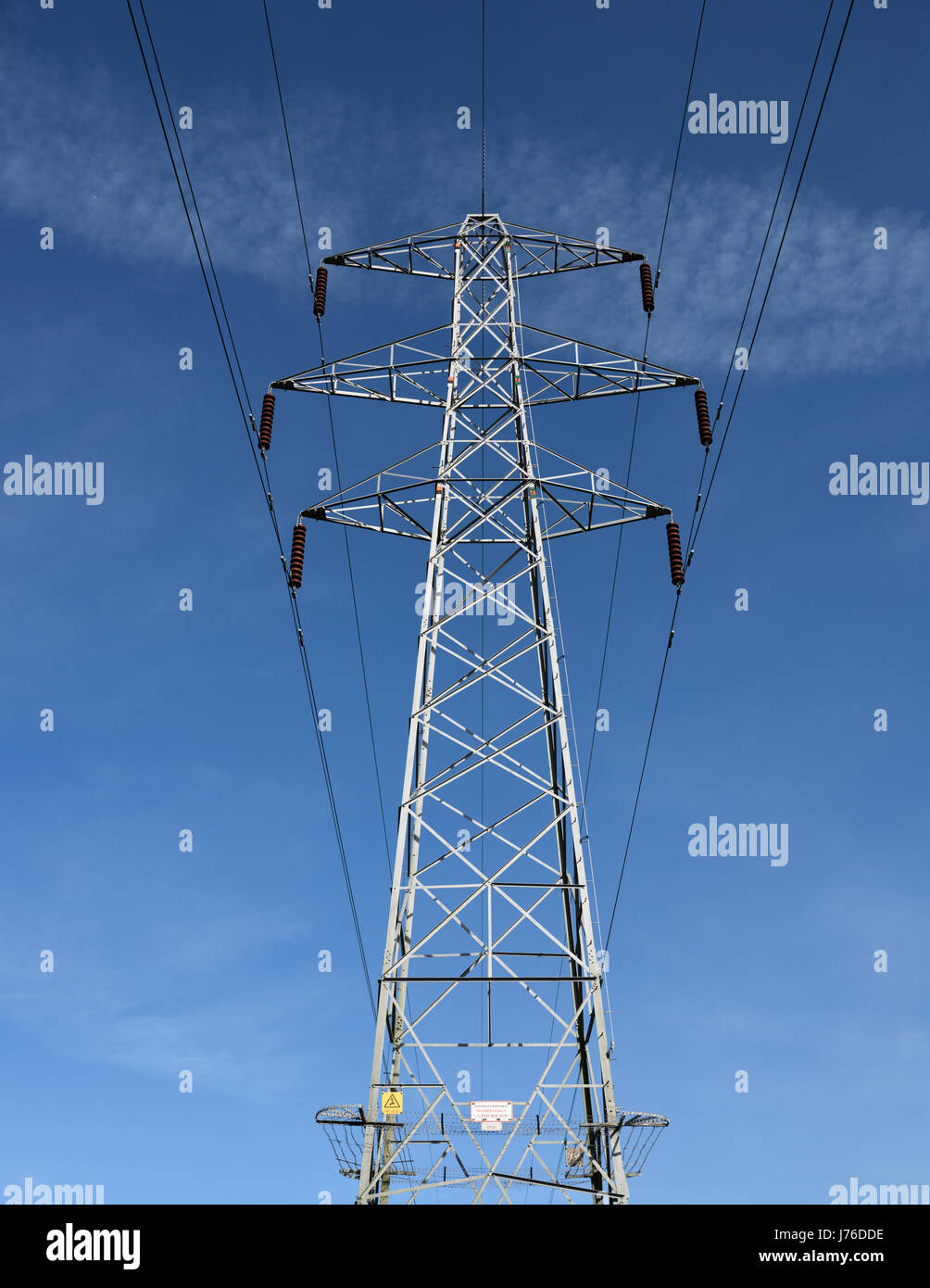 Electricity pylon and high voltage overhead power lines part of the the