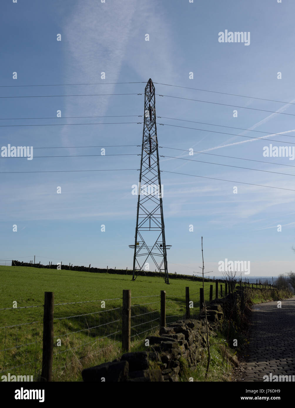 Electricity pylon and high voltage overhead power lines part of the the