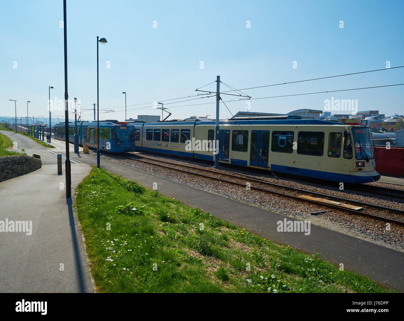Trams passing, Sheffield, South Yorkshire, England Stock Photo