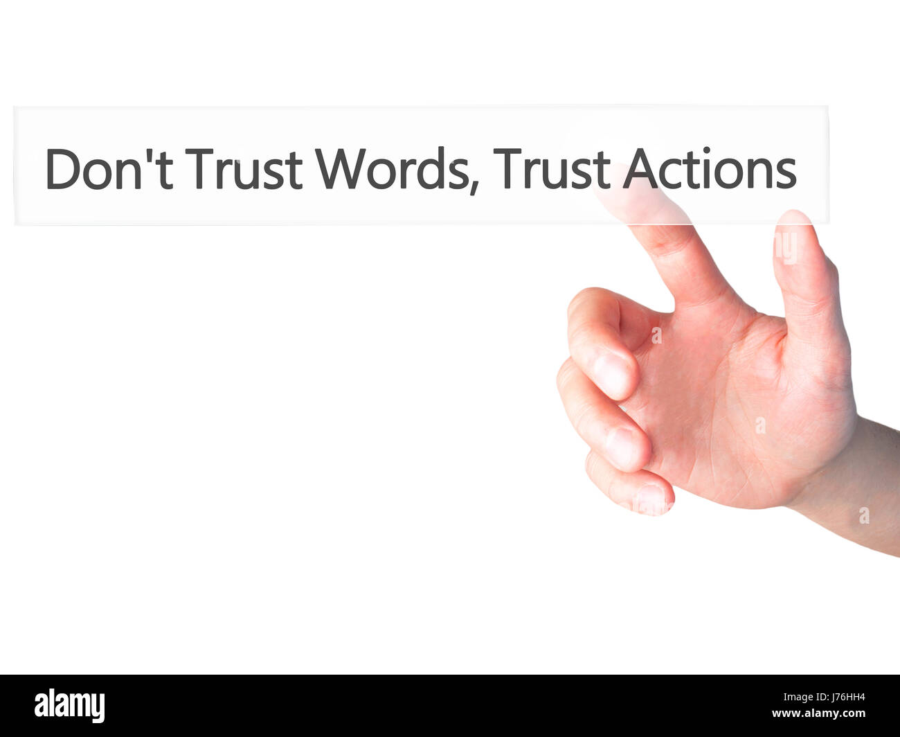 Don't Trust Words, Trust Actions - Hand pressing a button on blurred background concept . Business, technology, internet concept. Stock Photo Stock Photo