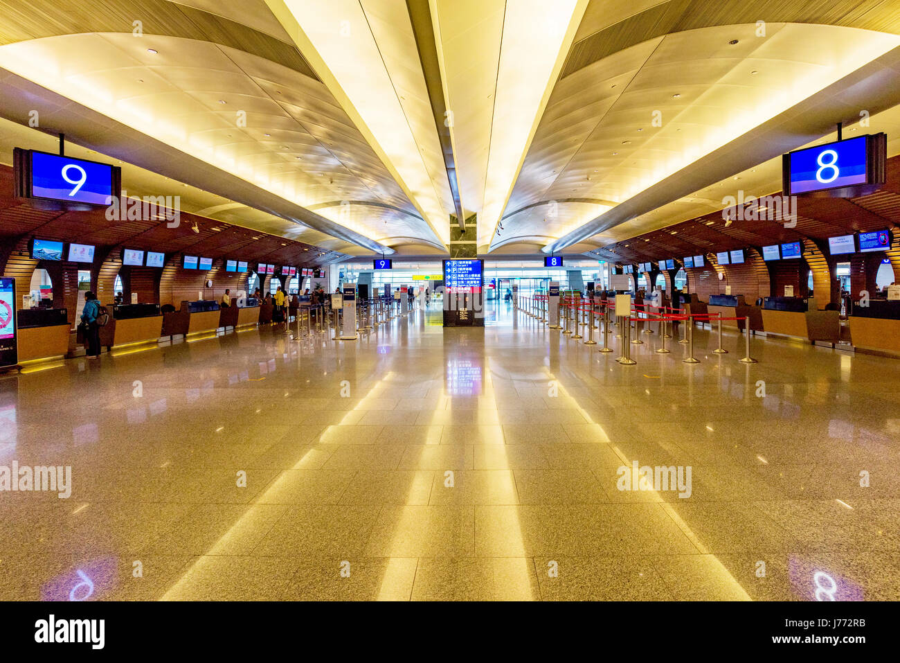 TAOYUAN, TAIWAN - APRIL 24TH: Taoyuan airport check in desk area where passenger come to check-in their luggage and receive their tickets on April 24, Stock Photo