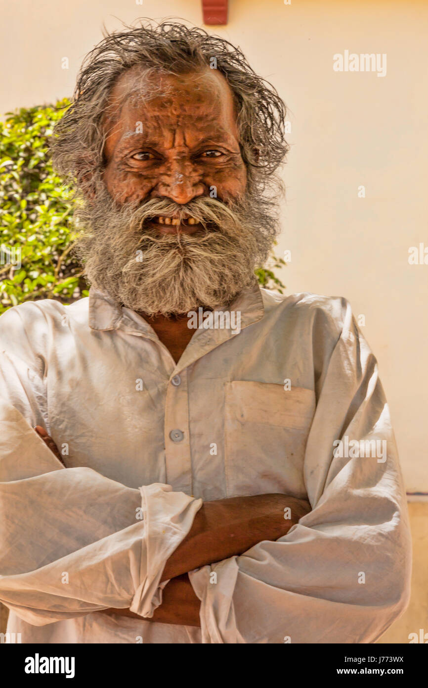 An Indian Artist with long hair & beard poses for the camera,  Jaipur,India,Asia,in uniform and street cloth, Male with have  beard,character Portrait Stock Photo - Alamy