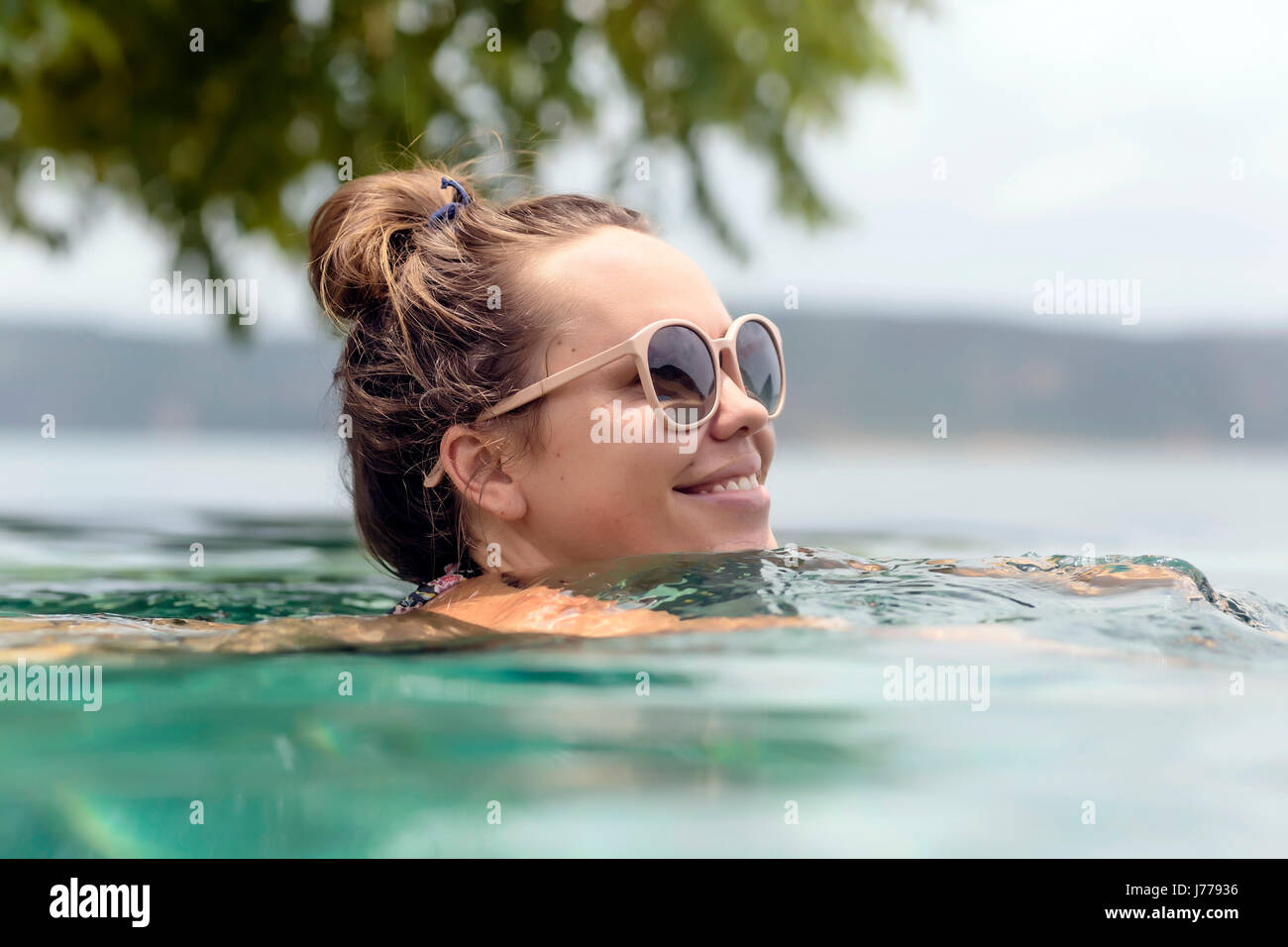 Swimming in sea hi-res stock photography and images - Alamy