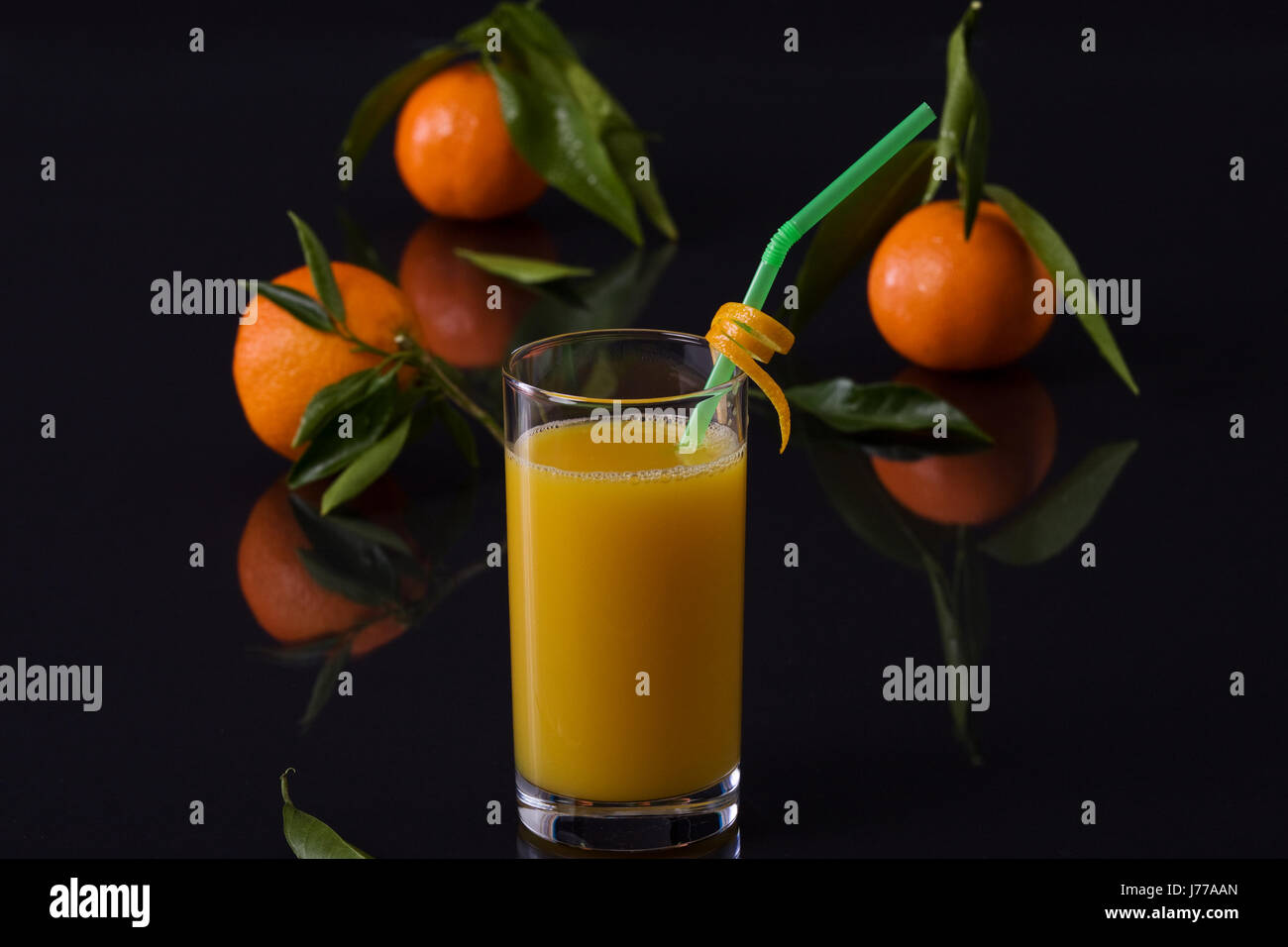 orange juice juice oranges straw fruit juice orange peel glass chalice