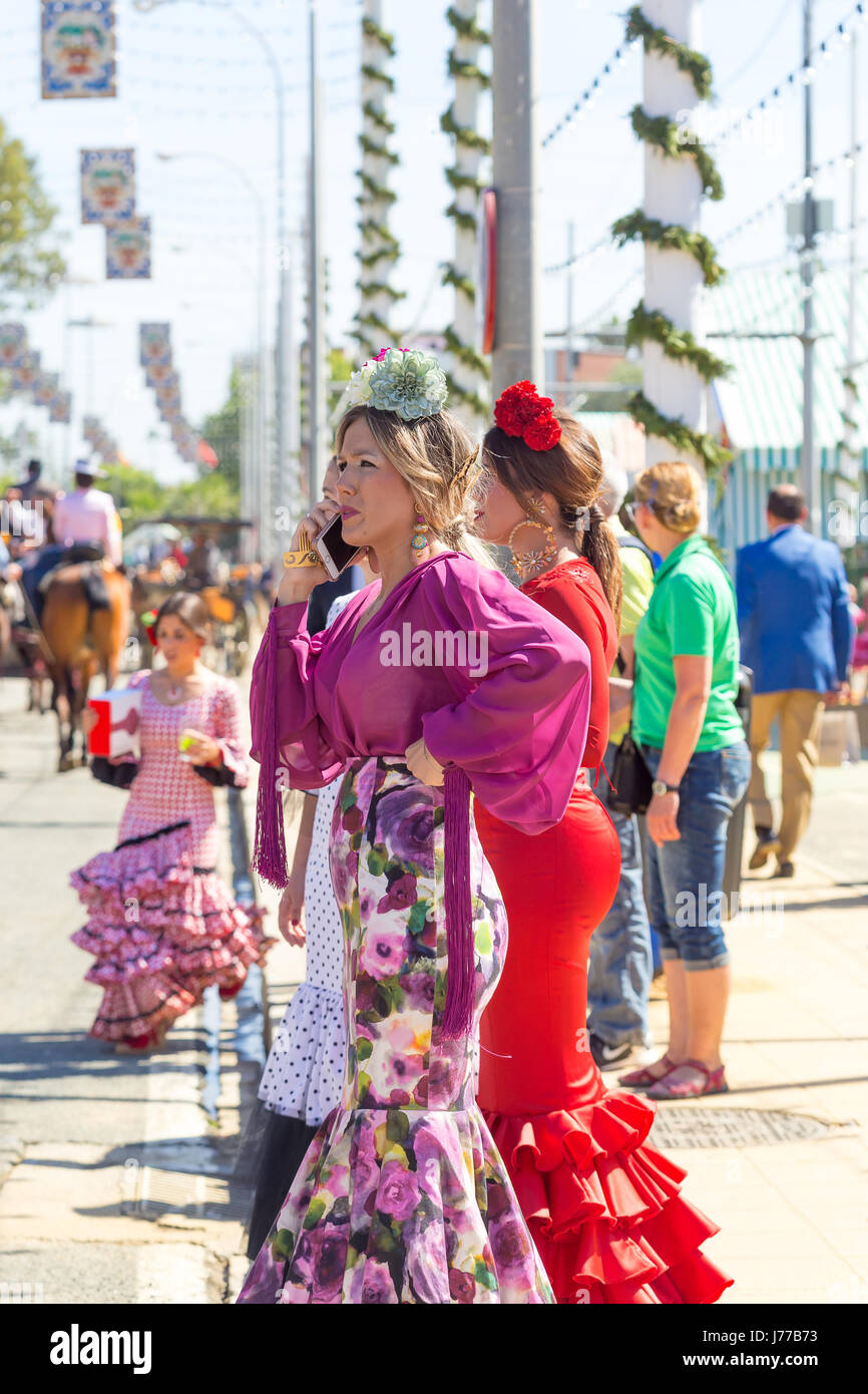 Seville, Spain May 02, 2017 Beautiful Women dressed in traditional