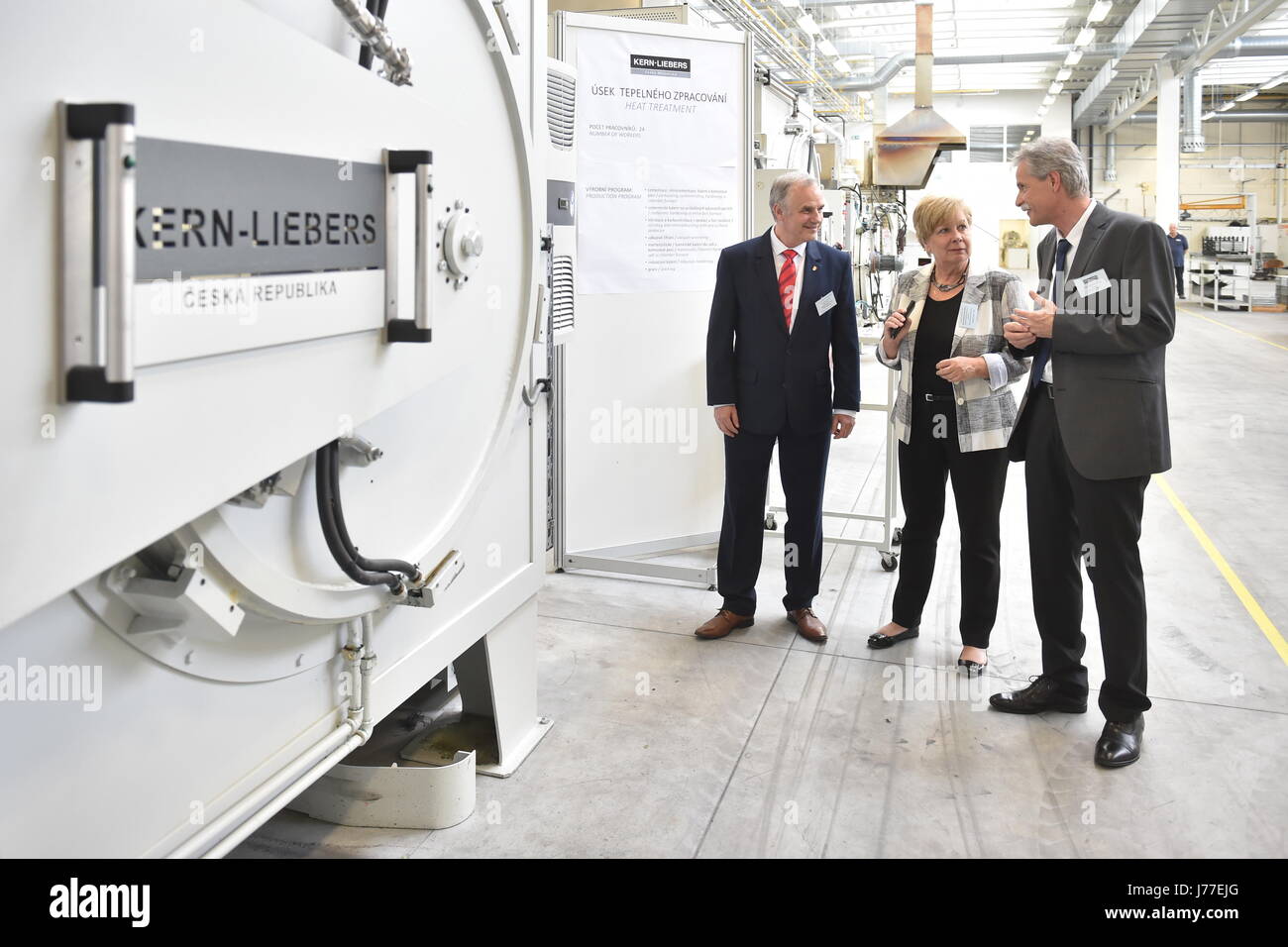 Kern-Liebers CR engineering company launches new production facility, in which it invested Kc500m, in Ceske Budejovice, Czech Republic, May 23, 2017. On the photo from left: Ceske Budejovice deputy Mayor Frantisek Konecny, South Bohemia Region Governor Ivana Straska and managing director of company Jaroslav Kopp. (CTK Photo/Vaclav Pancer) Stock Photo