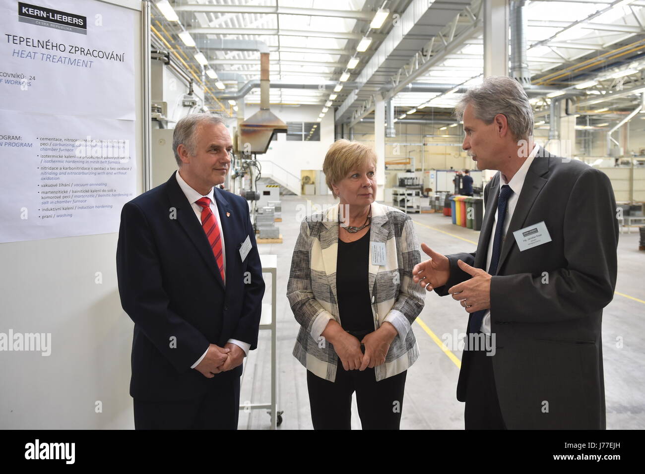 Kern-Liebers CR engineering company launches new production facility, in which it invested Kc500m, in Ceske Budejovice, Czech Republic, May 23, 2017. On the photo from left: Ceske Budejovice deputy Mayor Frantisek Konecny, South Bohemia Region Governor Ivana Straska and managing director of company Jaroslav Kopp. (CTK Photo/Vaclav Pancer) Stock Photo