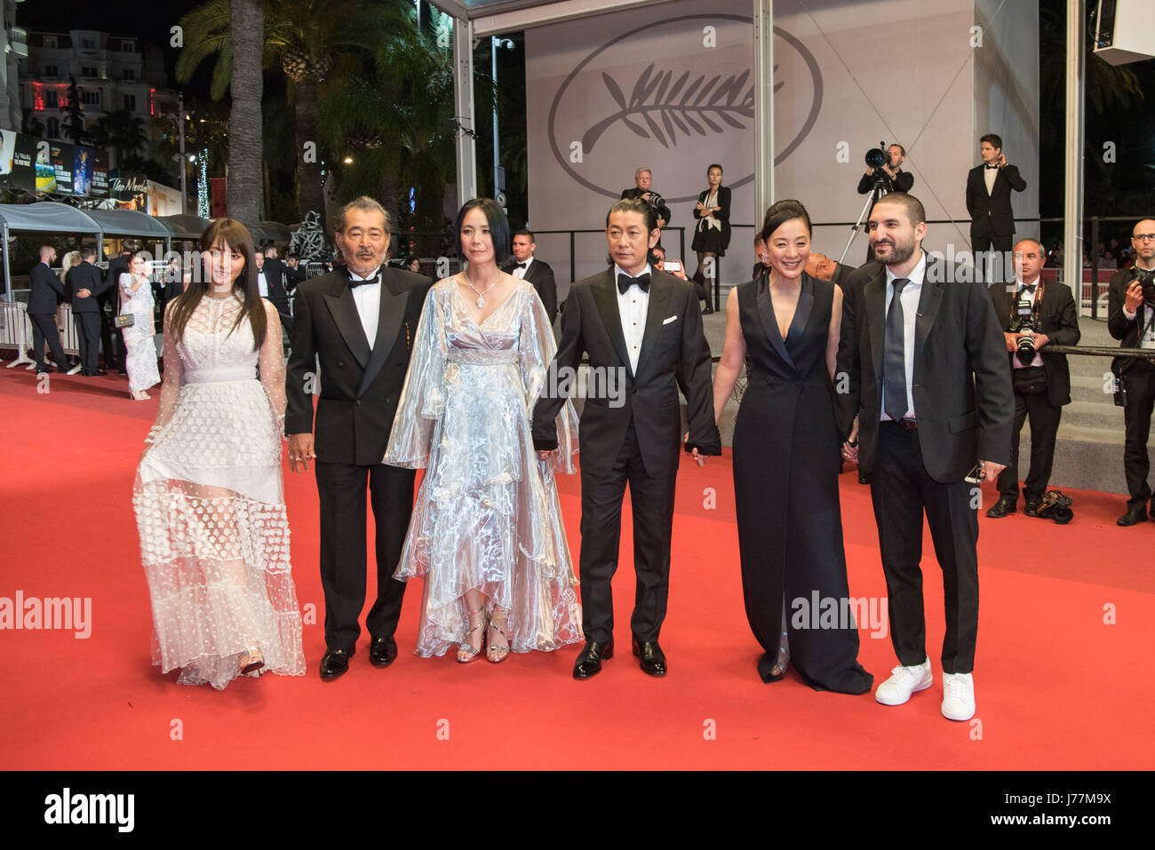Cannes, France. 23rd May, 2017. Actress Ayame Misaki, actor Tatsuya Fuji, Director Naomi Kawase, actor Masatoshi Nagase, actress Misuzu Kanno and composer Ibrahim Maalouf (L-R), pose on the red carpet for the screening of the film 'Radiance' in competition at the 70th Cannes Film Festival in Cannes, France, May 23, 2017. Credit: Chen Yichen/Xinhua/Alamy Live News Stock Photo